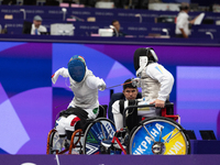 Beatrice Maria ''Bebe'' Vio Grandis of Italy competes against Nadiia Doloh of Ukraine during the Women's Foil Category B Quarterfinal at Gra...