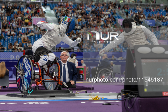 Beatrice Maria ''Bebe'' Vio Grandis of Italy competes against Nadiia Doloh of Ukraine during the Women's Foil Category B Quarterfinal at Gra...