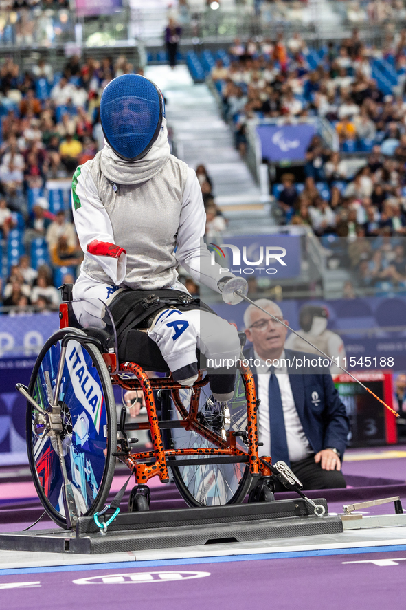 Beatrice Maria ''Bebe'' Vio Grandis of Italy competes against Nadiia Doloh of Ukraine during the Women's Foil Category B Quarterfinal at Gra...