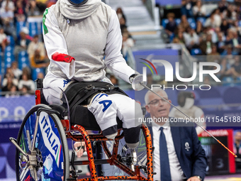 Beatrice Maria ''Bebe'' Vio Grandis of Italy competes against Nadiia Doloh of Ukraine during the Women's Foil Category B Quarterfinal at Gra...