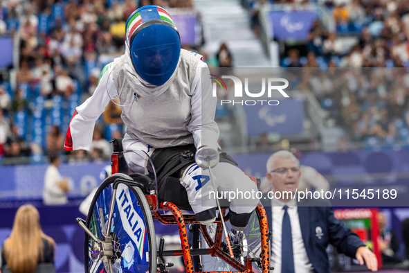 Beatrice Maria ''Bebe'' Vio Grandis of Italy competes against Nadiia Doloh of Ukraine during the Women's Foil Category B Quarterfinal at Gra...