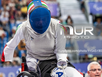 Beatrice Maria ''Bebe'' Vio Grandis of Italy competes against Nadiia Doloh of Ukraine during the Women's Foil Category B Quarterfinal at Gra...