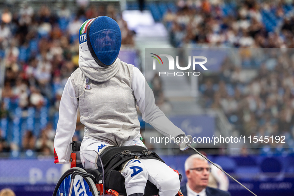 Beatrice Maria ''Bebe'' Vio Grandis of Italy competes against Nadiia Doloh of Ukraine during the Women's Foil Category B Quarterfinal at Gra...