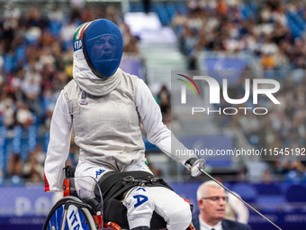 Beatrice Maria ''Bebe'' Vio Grandis of Italy competes against Nadiia Doloh of Ukraine during the Women's Foil Category B Quarterfinal at Gra...