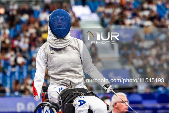 Beatrice Maria ''Bebe'' Vio Grandis of Italy competes against Nadiia Doloh of Ukraine during the Women's Foil Category B Quarterfinal at Gra...