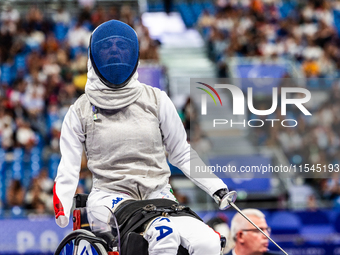 Beatrice Maria ''Bebe'' Vio Grandis of Italy competes against Nadiia Doloh of Ukraine during the Women's Foil Category B Quarterfinal at Gra...