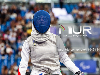 Beatrice Maria ''Bebe'' Vio Grandis of Italy competes against Nadiia Doloh of Ukraine during the Women's Foil Category B Quarterfinal at Gra...