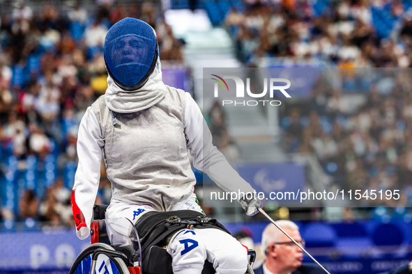 Beatrice Maria ''Bebe'' Vio Grandis of Italy competes against Nadiia Doloh of Ukraine during the Women's Foil Category B Quarterfinal at Gra...