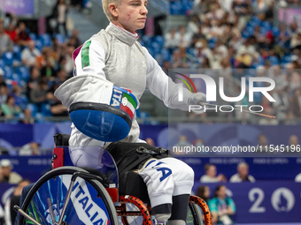 Beatrice Maria ''Bebe'' Vio Grandis of Italy competes against Nadiia Doloh of Ukraine during the Women's Foil Category B Quarterfinal at Gra...