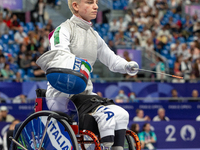 Beatrice Maria ''Bebe'' Vio Grandis of Italy competes against Nadiia Doloh of Ukraine during the Women's Foil Category B Quarterfinal at Gra...