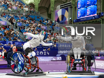 Beatrice Maria ''Bebe'' Vio Grandis of Italy competes against Nadiia Doloh of Ukraine during the Women's Foil Category B Quarterfinal at Gra...