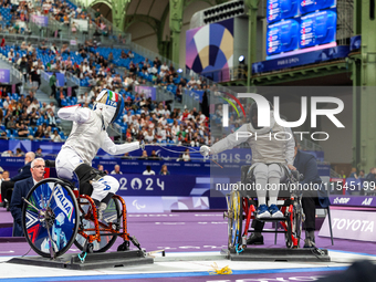 Beatrice Maria ''Bebe'' Vio Grandis of Italy competes against Nadiia Doloh of Ukraine during the Women's Foil Category B Quarterfinal at Gra...