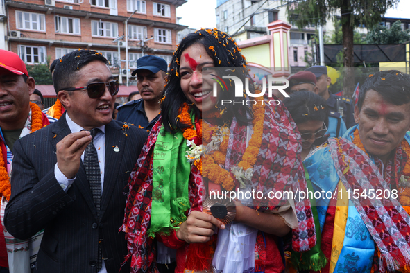 Nepali para athlete and first bronze medalist in Paralympics in Nepal's history, Palesha Goverdhan (center), is pictured during a public fel...