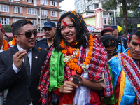 Nepali para athlete and first bronze medalist in Paralympics in Nepal's history, Palesha Goverdhan (center), is pictured during a public fel...