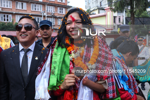 Nepali para athlete and first bronze medalist in Paralympics in Nepal's history, Palesha Goverdhan (center), is pictured during a public fel...