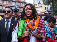 Nepali para athlete and first bronze medalist in Paralympics in Nepal's history, Palesha Goverdhan (center), is pictured during a public fel...