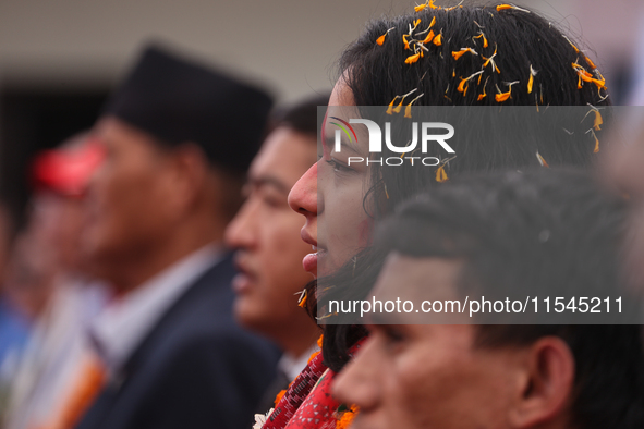 Nepali para athlete and first bronze medalist in Paralympics in Nepal's history, Palesha Goverdhan (center), is pictured during a public fel...