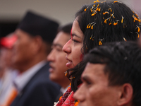 Nepali para athlete and first bronze medalist in Paralympics in Nepal's history, Palesha Goverdhan (center), is pictured during a public fel...