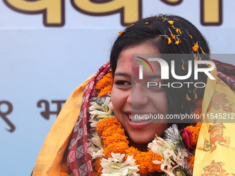 Nepali para athlete and first bronze medalist in Paralympics in Nepal's history, Palesha Goverdhan, is felicitated amid a public procession...