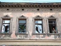 Windows knocked out by the shock wave from the Russian missile attack are in the building in the Zaliznychnyi district of Lviv, Ukraine, on...