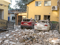 Two cars are crushed by the rubble in the Zaliznychnyi district after the Russian missile attack in Lviv, Ukraine, on September 4, 2024. In...