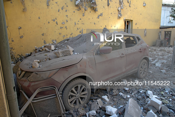 A car crushed by rubble is in the Zaliznychnyi district after the Russian missile attack in Lviv, Ukraine, on September 4, 2024. In the earl...