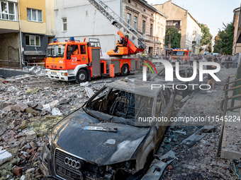 Destroyed cars are in the street in the Zaliznychnyi district after the Russian missile attack in Lviv, Ukraine, on September 4, 2024. In th...