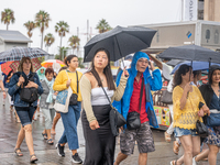 Tourists and locals walk through the city on a rainy September morning in Barcelona, Spain, on September 4, 2024. These first two weeks of S...