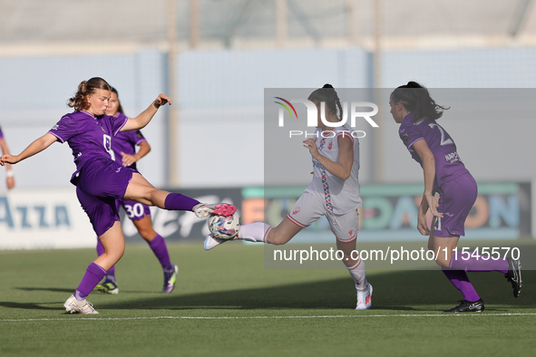 Senna Koeleman (L) of Anderlecht competes for the ball with Andela Milovanovic (R) of Crvena Zvezda during the UEFA Women's Champions League...