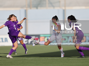 Senna Koeleman (L) of Anderlecht competes for the ball with Andela Milovanovic (R) of Crvena Zvezda during the UEFA Women's Champions League...