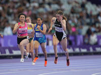 Danielle Aitchison of New Zealand celebrates winning silver in Women's 100m - T36 Final during the Paris 2024 Paralympic Games at Stade de F...