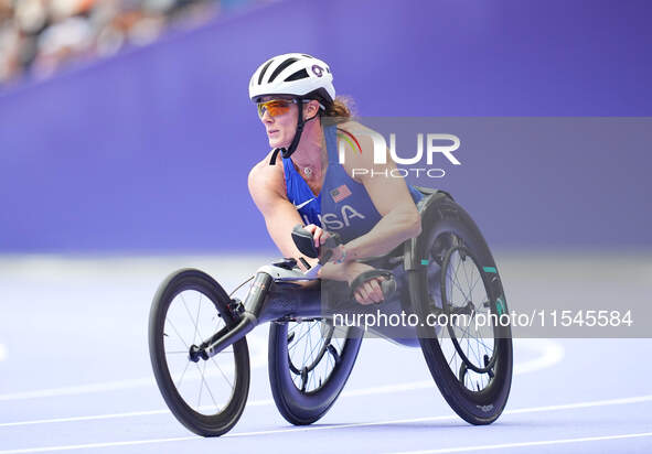 Hannah Dederick of United States of America in action in Women's 100m - T54 Final during the Paris 2024 Paralympic Games at Stade de France...