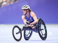 Hannah Dederick of United States of America in action in Women's 100m - T54 Final during the Paris 2024 Paralympic Games at Stade de France...