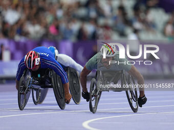 Adbulrahman Alqurashi of Saudi Arabia celebrates winning gold in Men's 100m - T53 Final during the Paris 2024 Paralympic Games at Stade de F...