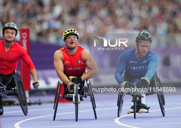 Juan Pablo Cervantes Garcia of Mexico celebrates winning gold in Men's 100m - T54 Final during the Paris 2024 Paralympic Games at Stade de F...