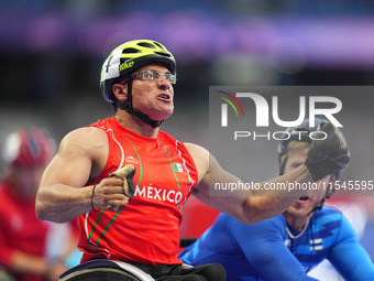 Juan Pablo Cervantes Garcia of Mexico celebrates winning gold in Men's 100m - T54 Final during the Paris 2024 Paralympic Games at Stade de F...