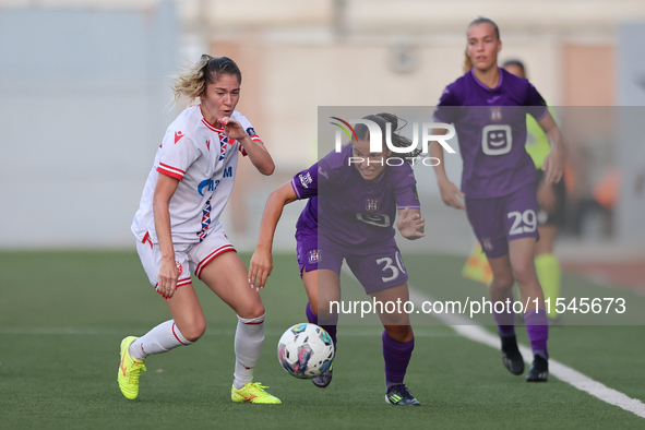 Luna Vanzeir (R) of Anderlecht is in action during the UEFA Women's Champions League First qualifying round, Semi-finals CP-Group 4 soccer m...