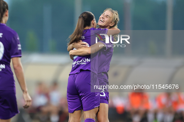 Luna Vanzeir (R) of Anderlecht celebrates scoring the 4-0 goal with teammate Stefania Vatafu (L) during the UEFA Women's Champions League Fi...