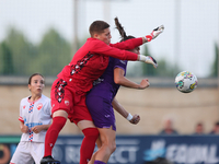 Roksana Shahanska, goalkeeper of Crvena Zvezda, punches the ball ahead of Amelie Delabre of Anderlecht during the UEFA Women's Champions Lea...