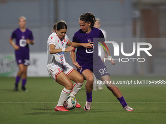 Nina Cavic (L) of Crvena Zvezda vies for the ball with Amelie Delabre (R) of Anderlecht during the UEFA Women's Champions League First quali...