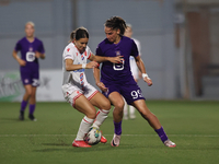 Nina Cavic (L) of Crvena Zvezda vies for the ball with Amelie Delabre (R) of Anderlecht during the UEFA Women's Champions League First quali...