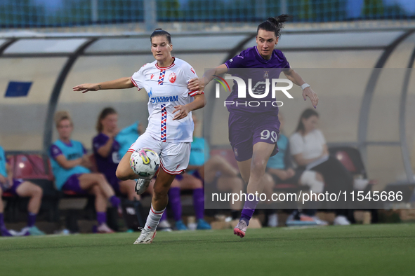 Tijana Djordevic (L) of Crvena Zvezda competes for the ball with Amelie Delabre (R) of Anderlecht during the UEFA Women's Champions League F...