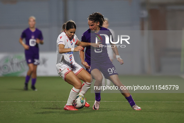 Nina Cavic of Crvena Zvezda vies for the ball with Amelie Delabre of Anderlecht during the UEFA Women's Champions League First qualifying ro...