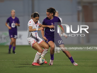 Nina Cavic of Crvena Zvezda vies for the ball with Amelie Delabre of Anderlecht during the UEFA Women's Champions League First qualifying ro...