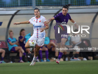 Tijana Djordevic of Crvena Zvezda competes for the ball with Amelie Delabre of Anderlecht during the UEFA Women's Champions League First qua...