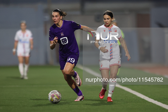 In Ta' Qali, Malta, on September 4, 2024, Nina Cavic (R) of Crvena Zvezda closely follows Amelie Delabre (L) of Anderlecht during the UEFA W...