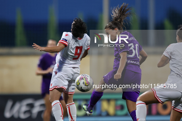 Luna Vanzeir of Anderlecht heads the ball towards the goal during the UEFA Women's Champions League First qualifying round, Semi-finals CP-G...