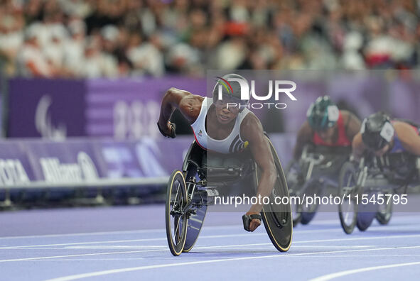 Lea Bayekula of Belgium celebrates winning gold in Women's 100m - T54 Final during the Paris 2024 Paralympic Games at Stade de France on Sep...