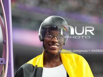 Lea Bayekula of Belgium celebrates winning gold in Women's 100m - T54 Final during the Paris 2024 Paralympic Games at Stade de France on Sep...