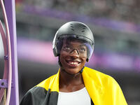 Lea Bayekula of Belgium celebrates winning gold in Women's 100m - T54 Final during the Paris 2024 Paralympic Games at Stade de France on Sep...